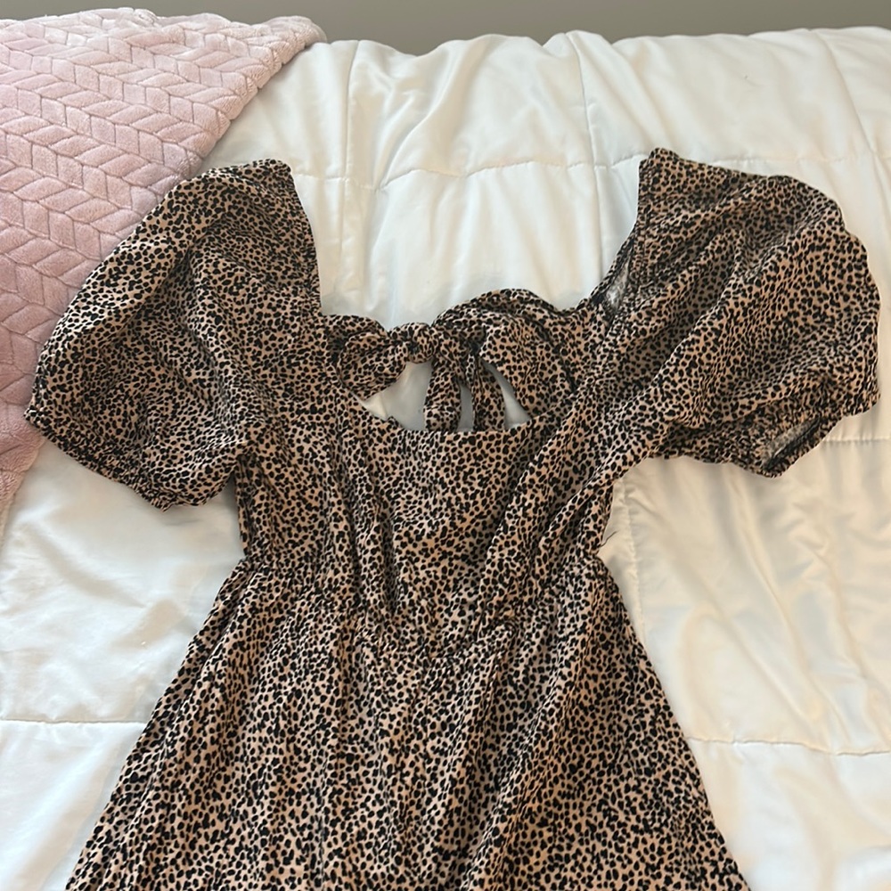Francesca’s Full Body Leopard Print Flowy Jumpsuit